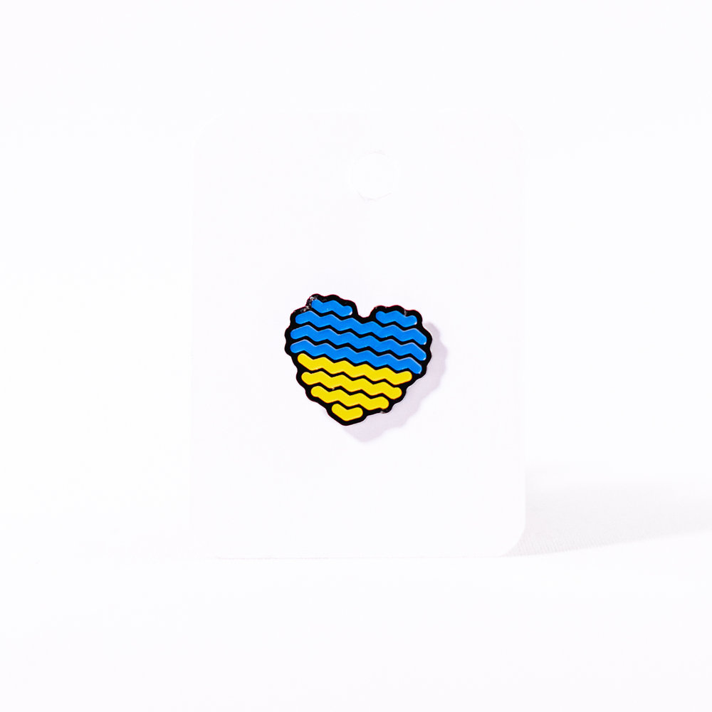 Значок металевий хвилі 